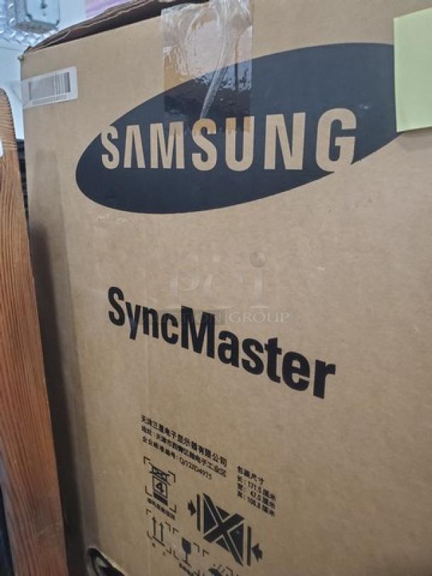 Samsung 650FP-2 65" Commercial LCD Display in original packaging. Features 1080p resolution. Box labeled "Samsung SyncMaster."