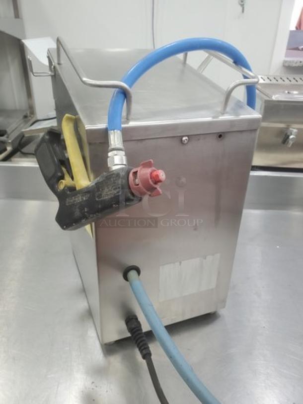 Apex Table Top Jelly Sprayer with hoses and nozzle, metallic finish. Unknown condition, sold as is.