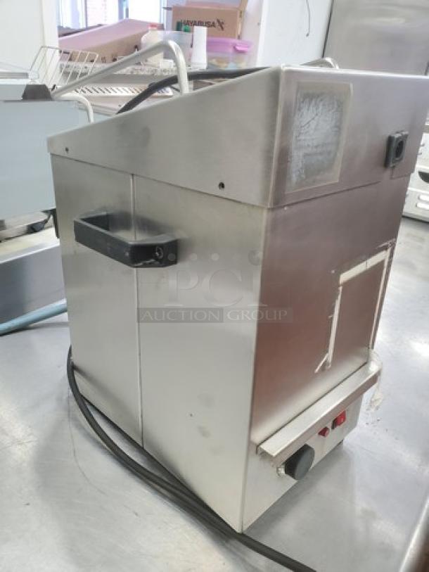 Apex Table Top Jelly Sprayer, metal casing, unknown condition, sold as is, showing power switch and handle.