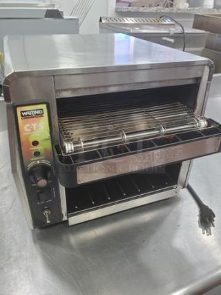 Waring CTS1000 Conveyor Toaster, stainless steel, 120V, 60Hz, 1800W, features adjustable controls, visible branding, good condition.
