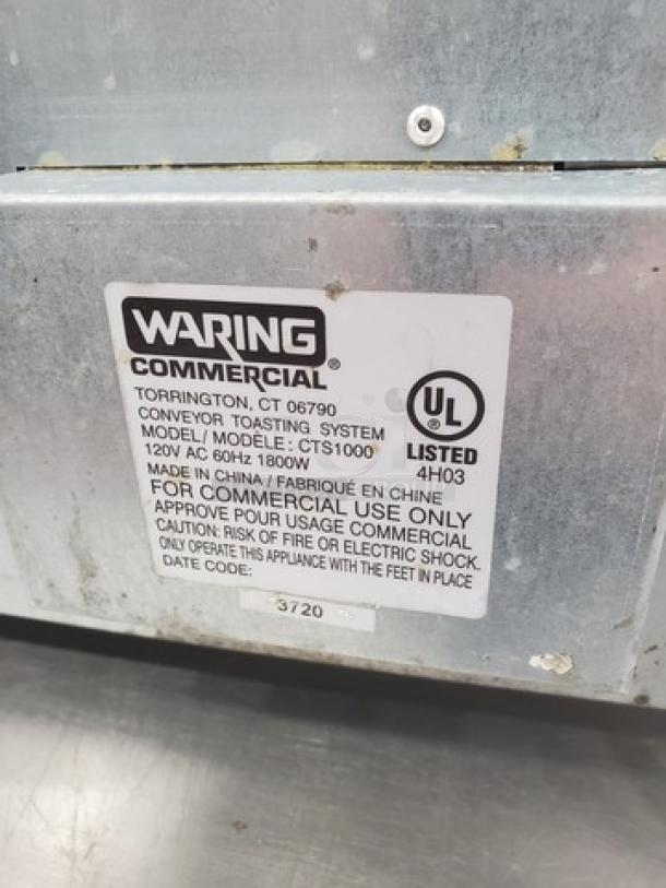 Waring CTS1000 Conveyor Toaster label, showing model, voltage, and power specifications.