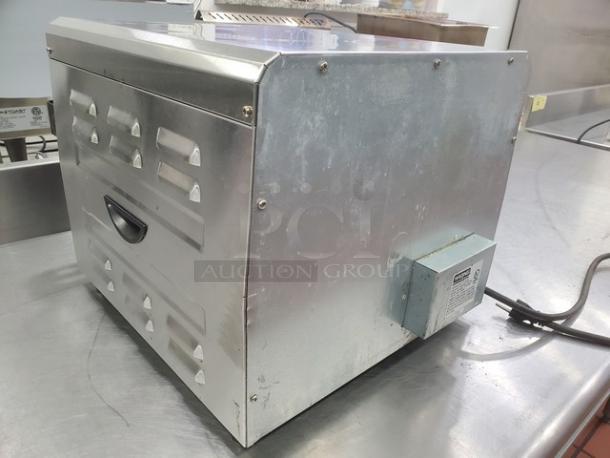 Waring CTS1000 conveyor toaster, stainless steel, 120V, 60 Hz, 1800W, some wear visible, ideal for commercial use.