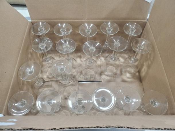 Lot of 18 clear glasses in a cardboard box, excellent condition, identical size and shape, no visible markings or labels.