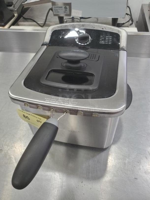 Farberware 103736 Countertop Fryer, stainless steel, black lid with handle, temperature dial visible, in good condition.