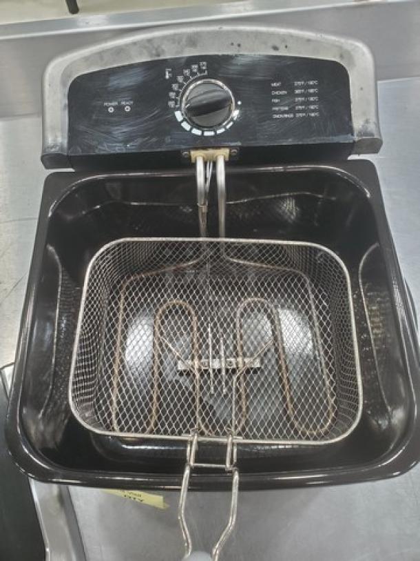 Farberware 103736 Countertop Fryer with adjustable temperature dial, metal frying basket, and visible heating element; used condition.