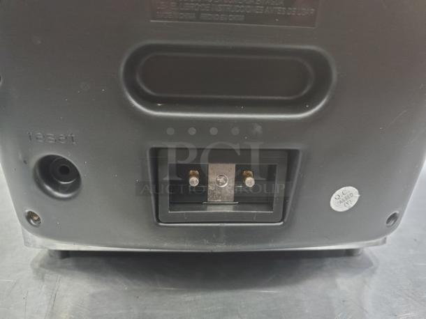 Farberware 103736 Countertop Fryer, black rear panel view, visible reset button, power connection port, QC passed sticker.