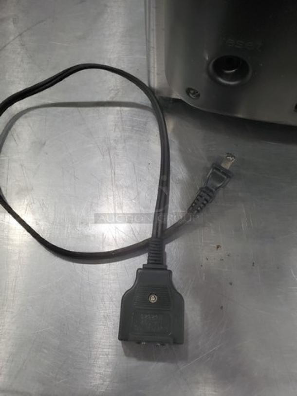 Farberware 103736 Countertop Fryer power cord on metallic surface. Cord in good condition, model labeling visible.