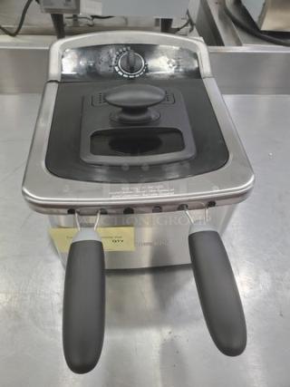 Farberware 103736 countertop fryer, stainless steel with black handles, adjustable temperature dial, appears in good condition.