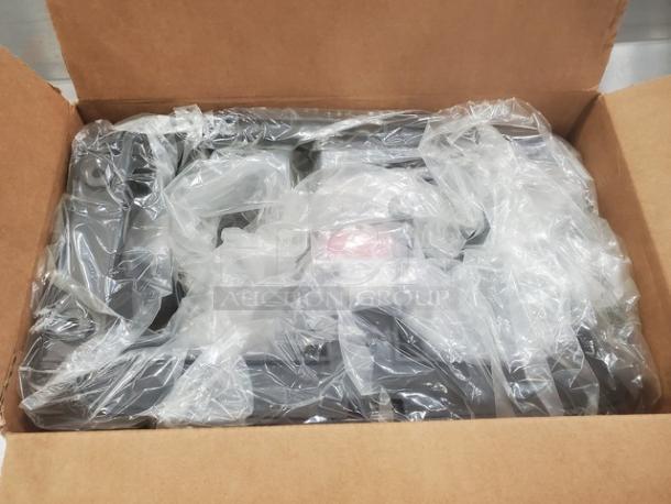 San Jamar Duett Tissue Dispenser in original packaging, new condition, black plastic, dual roll design, in open box.