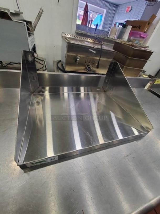 Regency Stainless Steel Microwave Shelf, Model 600MS1824, in excellent condition, features durable construction.