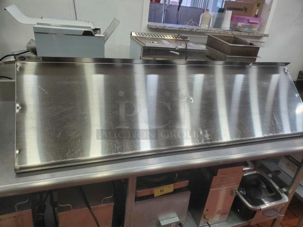 Gridmann stainless steel wall mount shelf; sleek, durable; minor surface scratches; ideal for kitchens; easy installation.