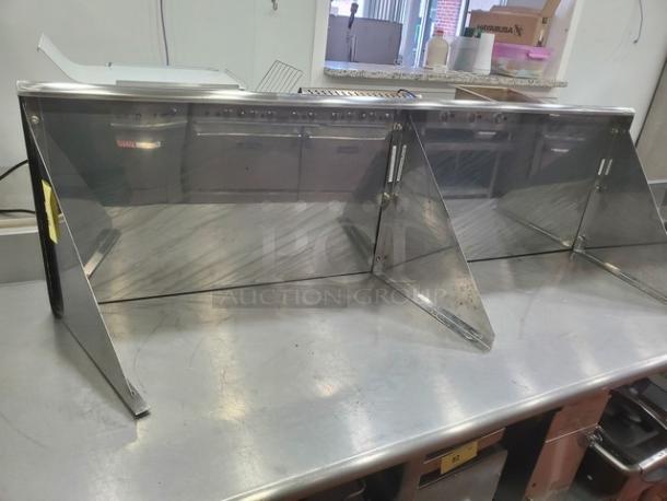 Gridmann stainless steel wall mount shelf in excellent condition, featuring sturdy construction and two support brackets.