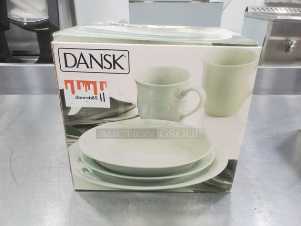 Dansk Celadon 16 Piece Set in original box. Includes plates, bowls, cups. New condition, box shows brand and item details.