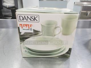 Dansk Celadon 16 Piece Set in original box. Includes plates, bowls, cups. New condition, box shows brand and item details.