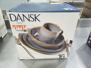 Dansk Haldan 16 Piece Set, new in box. Includes plates, bowls, and mugs. Box showing gray dinnerware with brown rims.