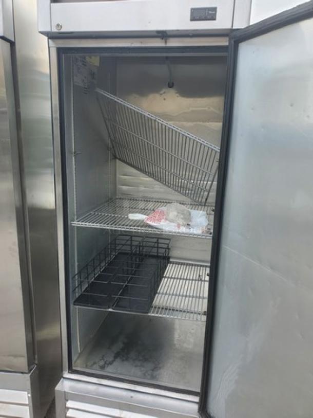True T-23 Reach-In Refrigerator, stainless steel, two shelves, open door showing interior, used condition.
