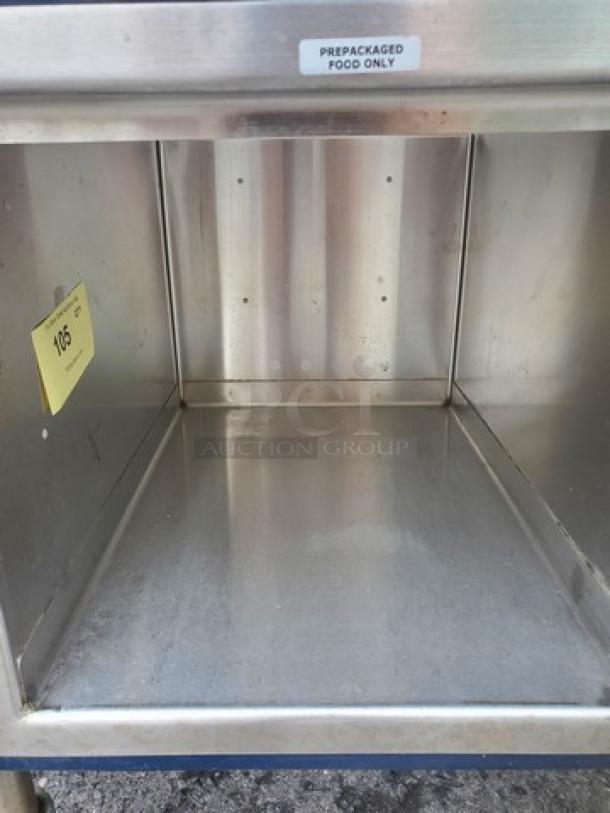 Colorpoint Portable Work Counter, model K28-ST, stainless steel, prepackaged food label, shelf number 105, used condition.