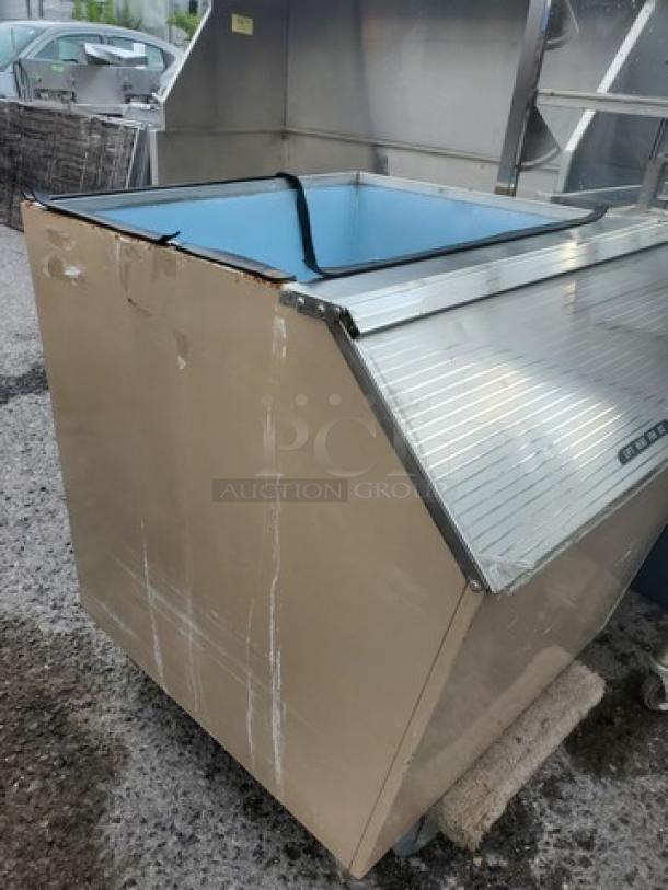 Manitowoc C400 Top Mount Ice Maker Storage Bin, used condition with visible wear on the exterior, blue interior lining.