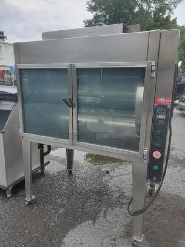 Hardt Inferno Natural Gas Rotisserie Oven, stainless steel, dual glass doors, control panel visible.