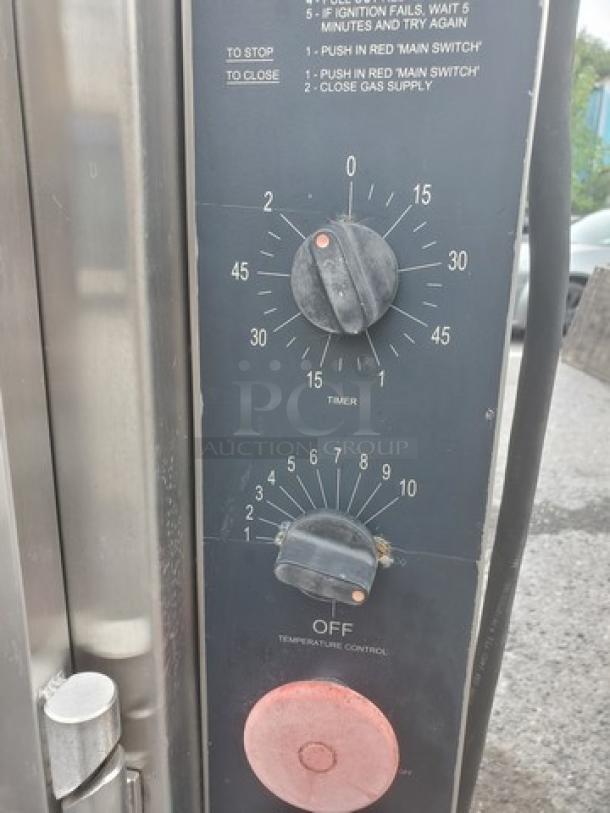 Hardt Inferno Natural Gas Rotisserie Oven with control panel showing timer and temperature knobs. Used condition.