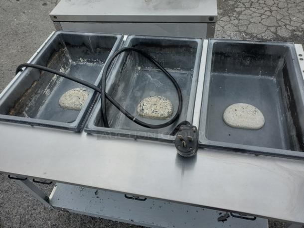 Vollrath 38213 ServeWell Hot Food Table Well with three compartments, used condition, visible power cord.