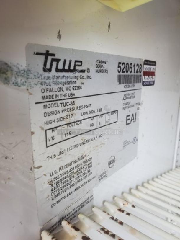 True TUC-36 Undercounter Refrigerator label, showing model, design pressures, voltage, and serial number, made in USA.