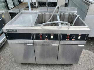 Hobart HFD50 Electric Fryer, model HFD50, 208v, 3 PH. Features dual fry baskets, stainless steel build, control knobs, and Hobart branding.