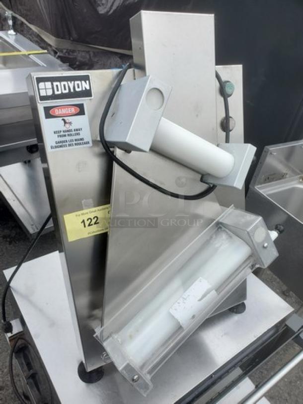 DOYON DL12DP 12" countertop dough roller sheeter, stainless steel, unknown condition, visible labels and model markings.