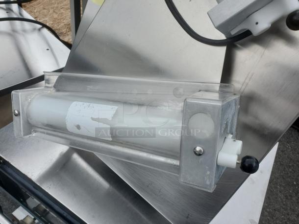 Doyon DL12DP 12" dough roller sheeter, countertop model. Visible wear, unknown condition. Sold as is.