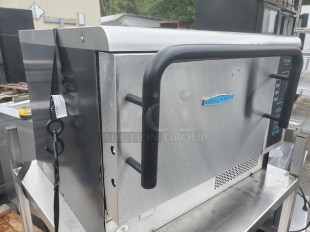 Turbochef Tornado NGCD6 high-speed convection oven, stainless steel, with control panel. Good condition.