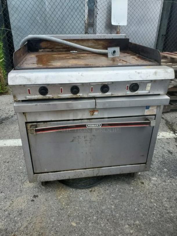 Hobart HCR421 36" electric range with convection oven, 208V, 3 PH, 60 Hz, used condition, visible wear on surface.