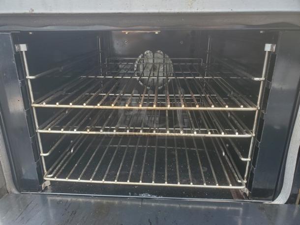 Hobart HCR421 36" electric range with convection oven, featuring racks and a spacious interior. Model HCR421, 208V, 3 PH, 60 Hz.