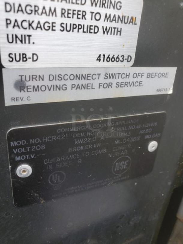 Hobart HCR421 electric range with convection oven, model details and warnings on visible label. 208V, 3 PH, 60 Hz.