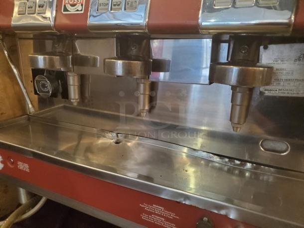 Brasilia Rossi Espresso Machine, 3 Group, Model 205EX FNC DIG 3. Features stainless steel finish, controls, tags indicating 230V, 60 Hz.