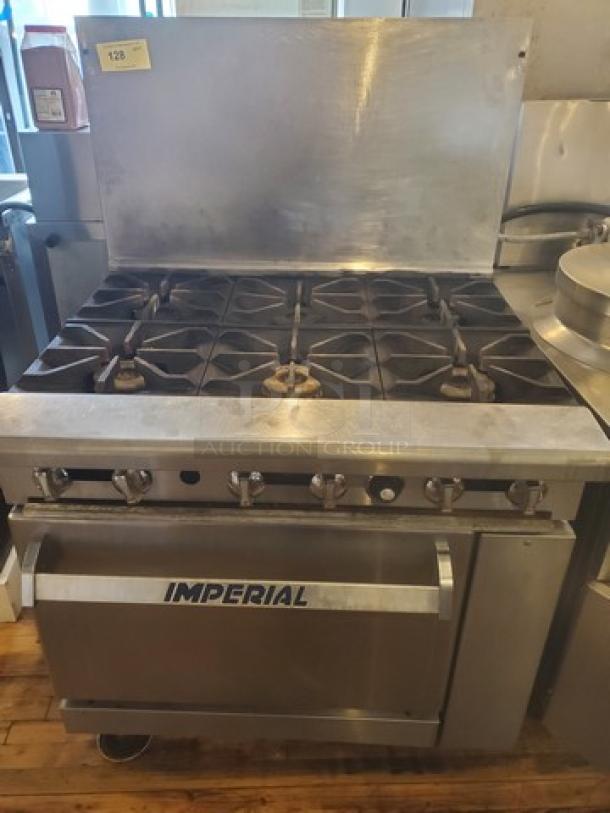 Imperial IR-6 gas restaurant range, 36"W with 6 burners, 1 standard oven. Stainless steel, good condition, visible branding.