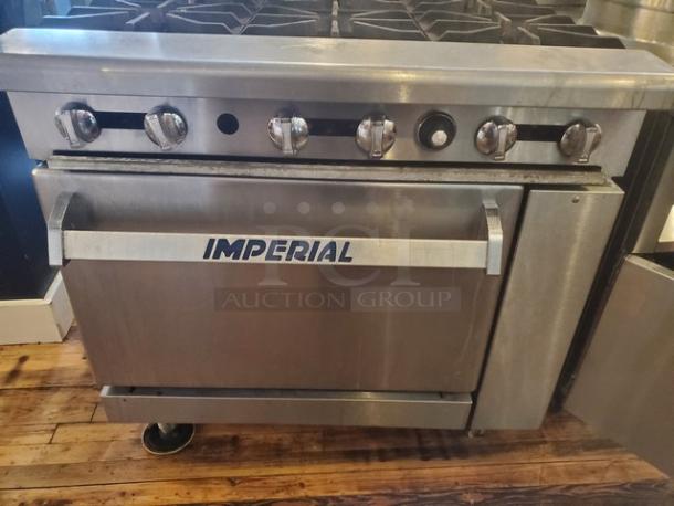 Imperial IR-6 gas restaurant range, 36"W, 6 burners, 1 standard oven, stainless steel, good condition, visible Imperial logo.