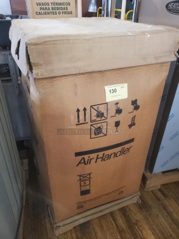 AC Air Handler 2TEC3F24B1000A, new in original box, visible handling symbols, Model 2TEC3F24B1000A.