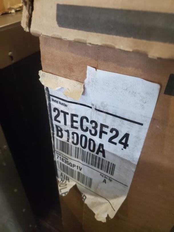 AC Air Handler 2TEC3F24B1000A, new in box, model number visible on label. Never used, pristine condition.