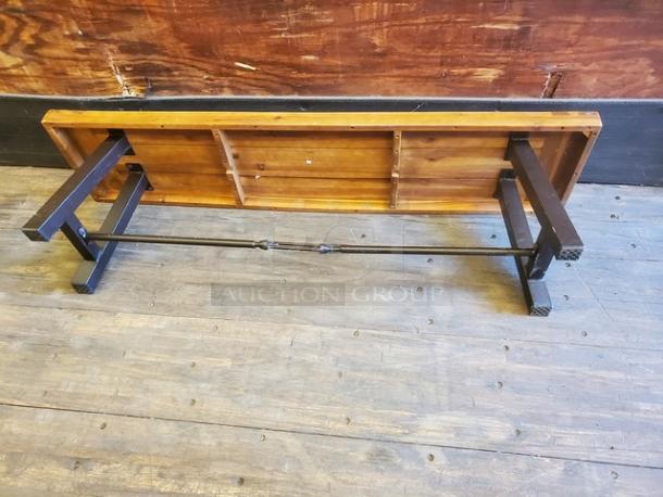 Lot of 2 wooden benches with sturdy metal legs, natural finish, in good condition, ideal for rustic or industrial decor.
