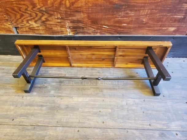 Lot of 2 wooden benches, sturdy construction, metal support bars, natural wood finish, excellent condition, no visible defects.