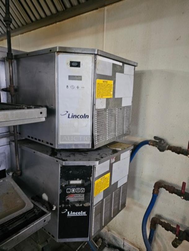 Lincoln Impinger double stack natural gas pizza conveyor oven, model 1600-015-AR, stainless steel, visible labels and controls.