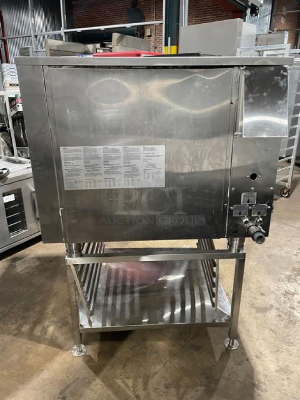 Alto-Shaam combi oven model CTC7-20E, 2017, electric, stainless steel, digital push controls, on legs, includes pan-holding stand.