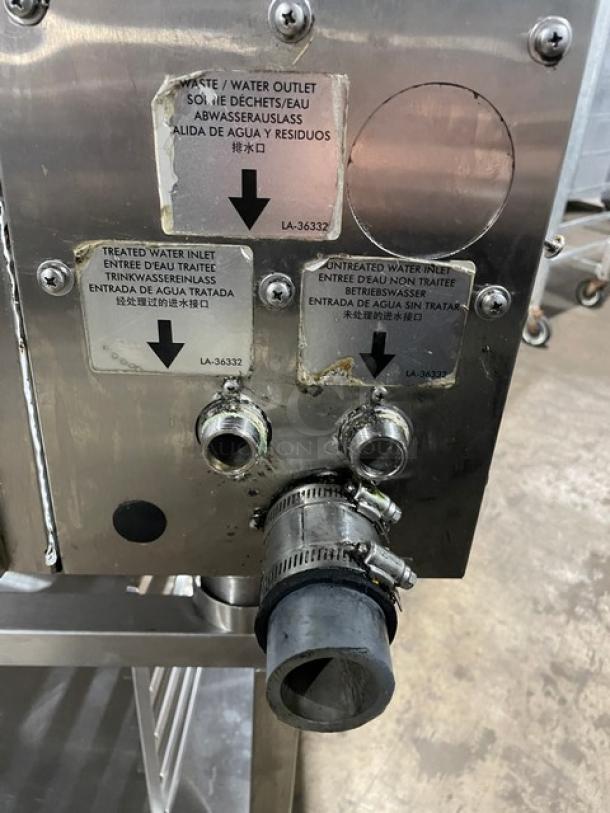 Alto-Shaam CTC7-20E combi oven, stainless steel, water inlets and outlets, labels showing treated/untreated water.
