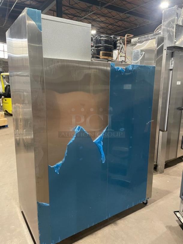 Traulsen Spec-Line 2-Door Stainless Steel Freezer, Model RLT232WUTFHS, on casters, with protective blue film.