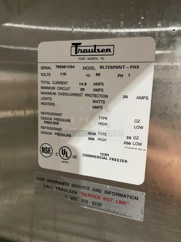 Traulsen Spec-Line Series stainless steel 2-door reach-in freezer, model RLT232WUTFHS, with chrome racks, on casters.