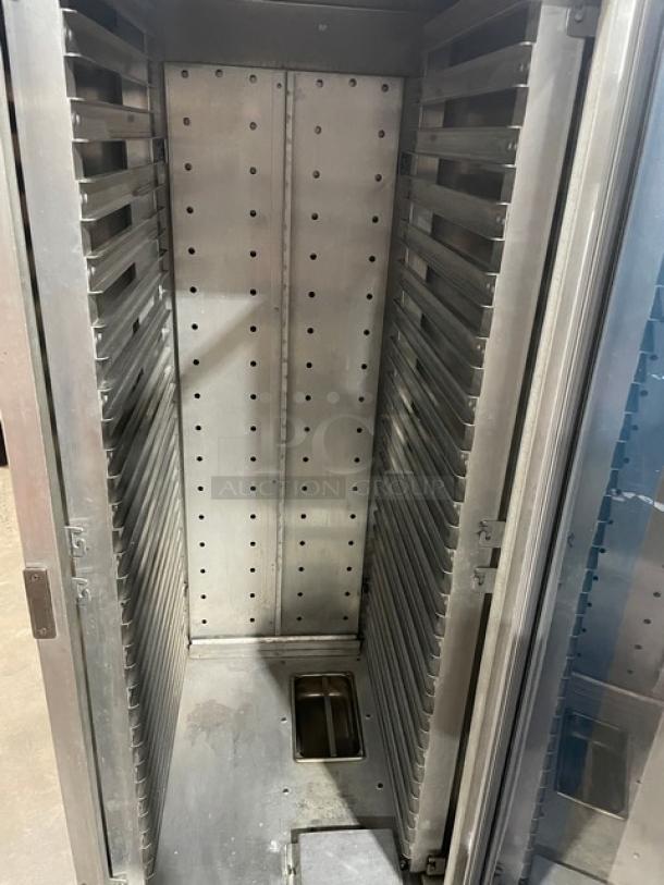 Metro C175-H(1)N heated holding/proofing cabinet with single glass swing door, built-in pan slides, on casters.