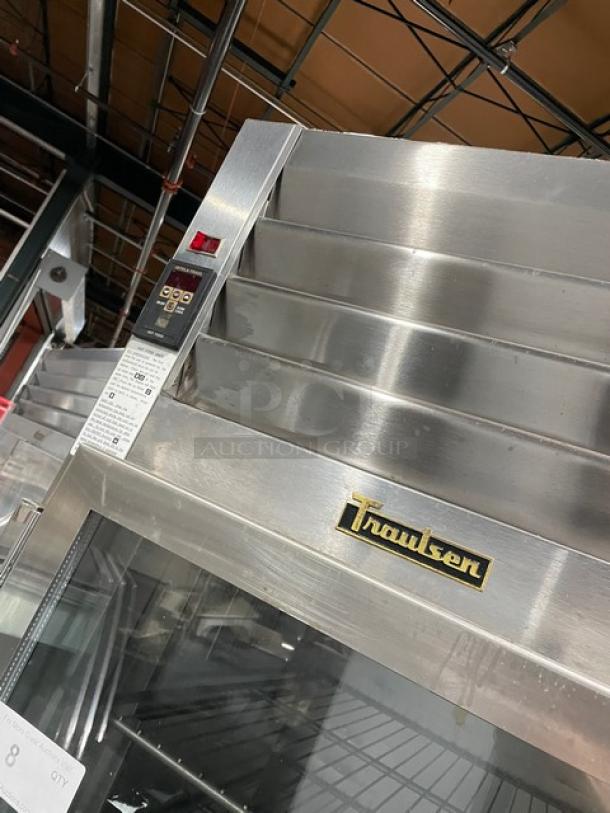 Traulsen stainless steel hot food merchandiser, model AW132NX0001, single glass door, wire racks, on casters, 208/115V.