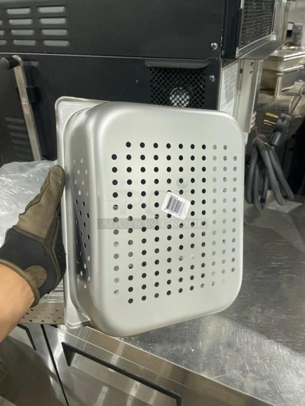 Stainless steel perforated steamtable pan, Production 125th, Model 880243, new condition, barcode on side.