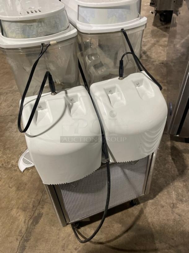 Bunn Ultra-2 commercial double slushy machine, white stainless steel, on legs. Includes drip tray. 120V, 1 phase. Model: Ultra-2 SN: ULTR107509.