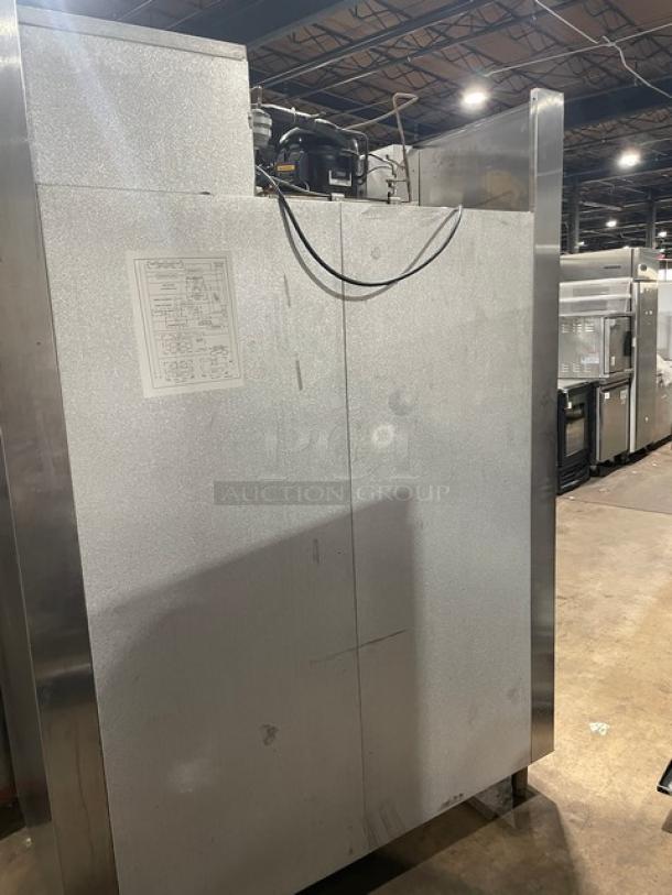Traulsen Spec Line Series commercial stainless steel refrigerator, model AHT232WUTHHS, features 4 half doors, wire racks, pan slides, 115V, on legs.